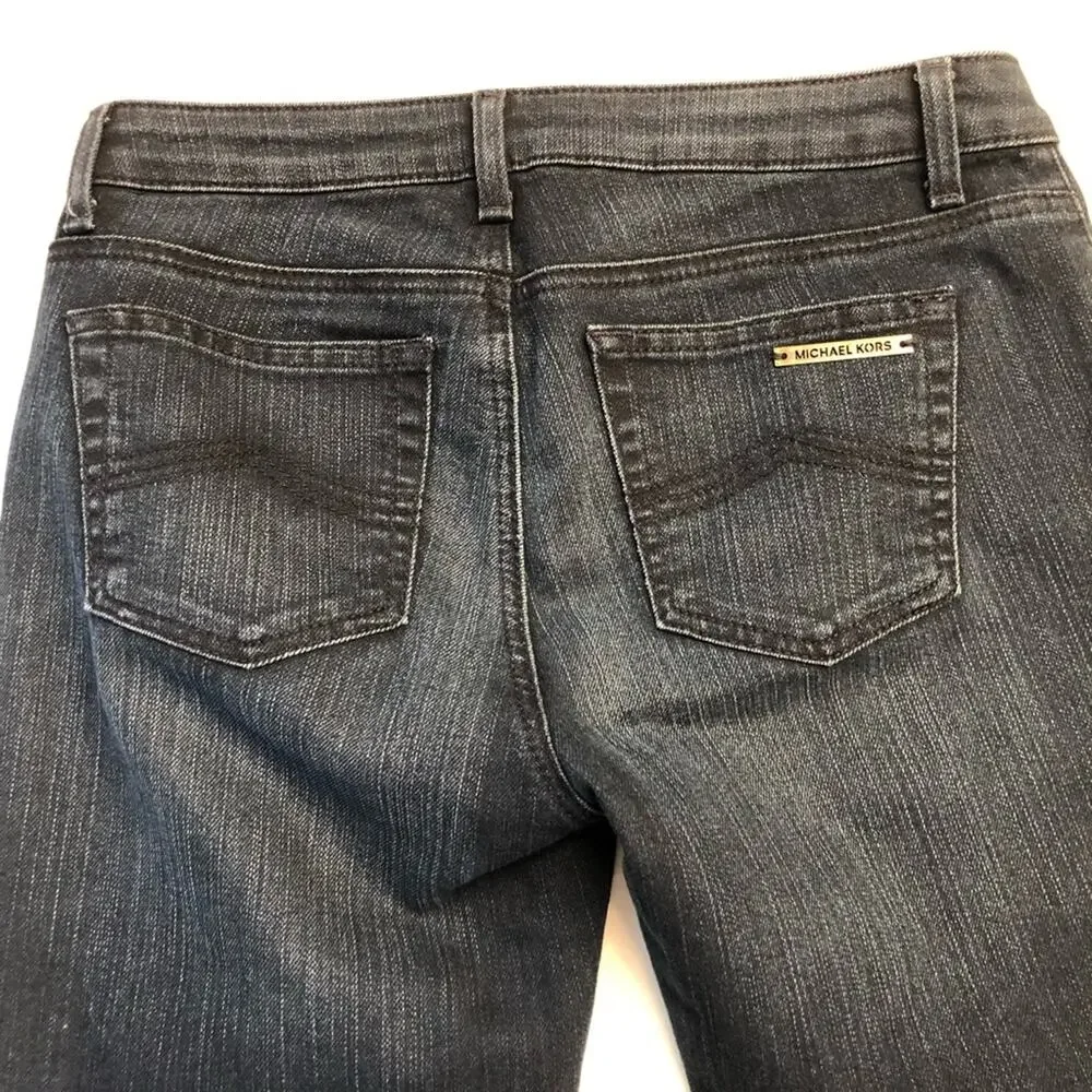 Michael Kors Blue jeans with raw edge folded hem tapered stretch. Size 4.